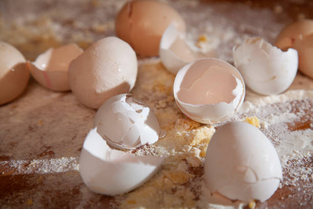 istock kitchen background made of flour v and eggshells 1448396943