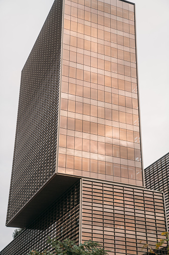 architectural details of a glass and steel office building.