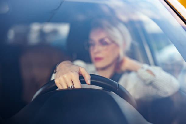 istock An Anonymous Businesswoman Driving Car 1448400366