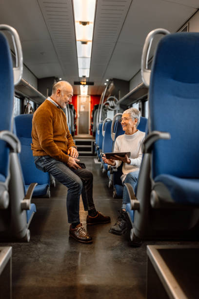 istock Mature spouses enjoying their railroad car journey 1448408463