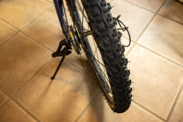 istock Rear wheel of a bicycle standing on the ground 1448410838