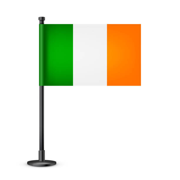 istock Realistic Irish table flag on a black steel pole. Souvenir from Ireland. Desk flag made of paper or fabric and shiny metal stand. Mockup for promotion and advertising. Vector illustration 1448417858