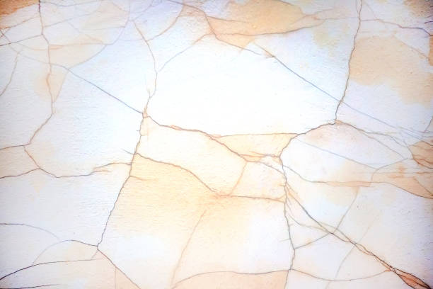 istock cracked paint on the wall. abstract background texture 1448421673