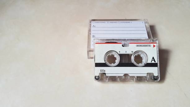 istock Close up of microcassette with marble granite background 1448424567