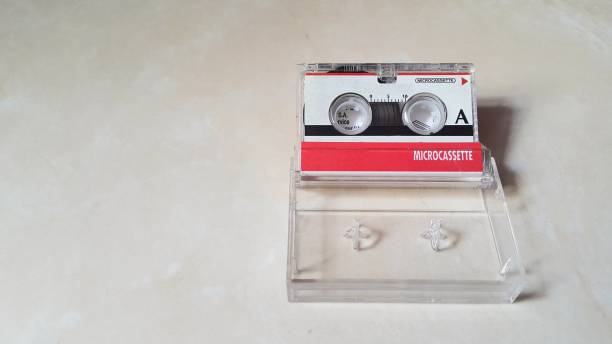 istock Close up of microcassette with marble granite background 1448424789