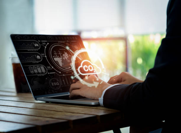 istock Renewable energy-based green businesses with limit climate change and global warming. Carbon dioxide reduction emission concept. Co2 management icon and sustainable symbols virtual on laptop computer. 1448426592