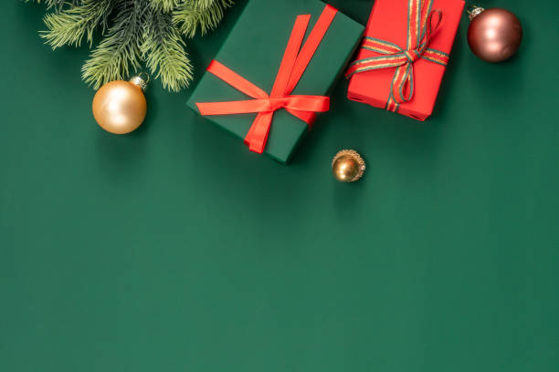 istock Christmas composition. Christmas gifts and decorations on green background. 1448428676