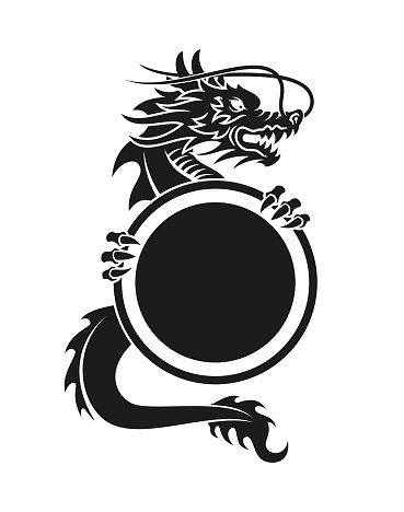 Dragon silhouette holding a shield with place for your text, sign, logo, etc. - cut out vector icon