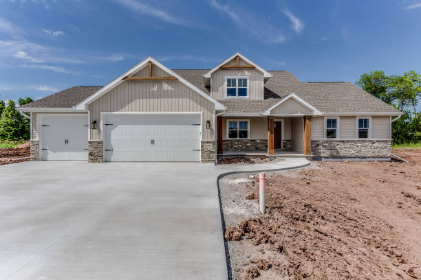 istock Three car garage and new home 1448433430