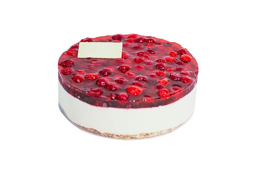 Cherry berry cheesecake, smooth creamy cheesecake topped with whole glazed cherries and mixed berries, selective focus, isolated