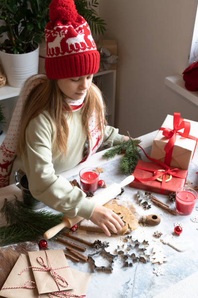 istock The girl prepares sweets for Christmas. 1448449724