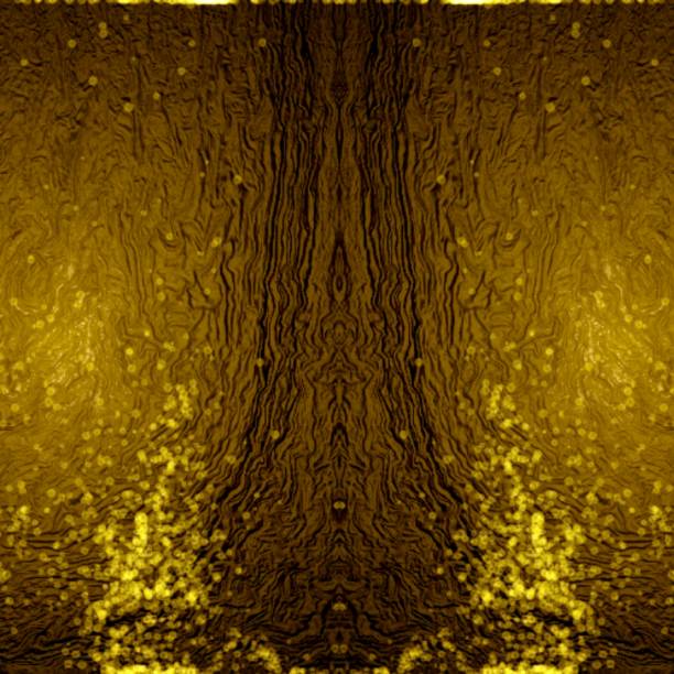 istock Bright golden color particles on dark background 1448450869