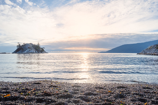 View of the ocean from rocky beach at Whytecliff Park, West Vancouver, British Columbia, Canada.