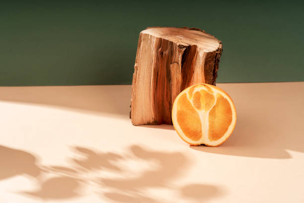 istock Composition empty podium material wood stone orange. Product presentation. The background is beige orange. Beautiful background from natural materials. 1448461887