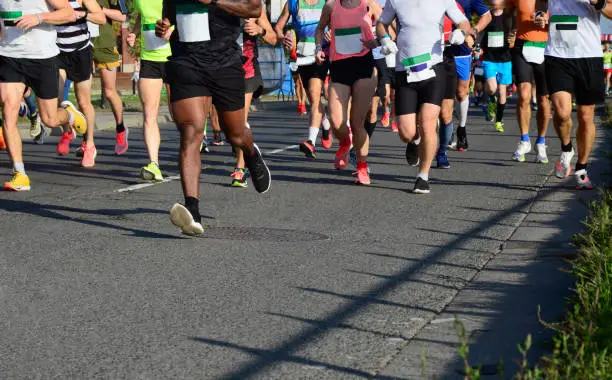 Lady and gent runners competing on the streets of Budapest, Hungary.