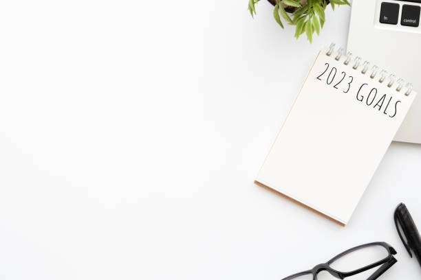 istock Notebook with 2023 goals text on it to apply new year resolutions and plan. 1448467159