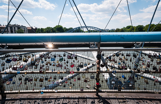 love locks on a bridge across a river
