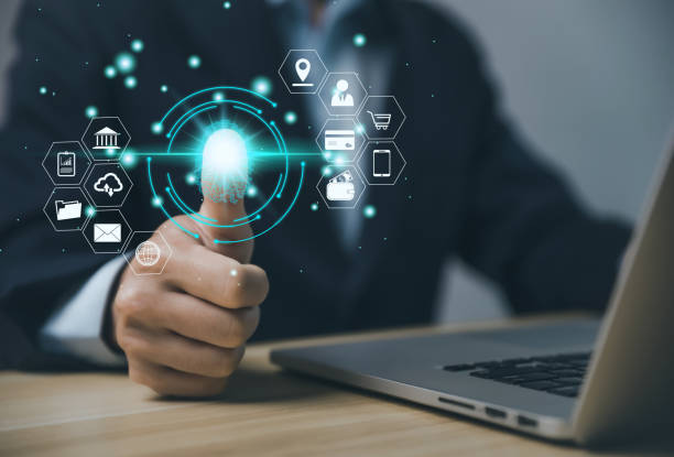 istock Businessman scanning fingerprint on laptop digital technology access 1448472389