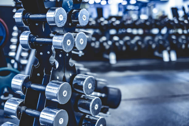 istock rack with a set of dumbbells 1448472429
