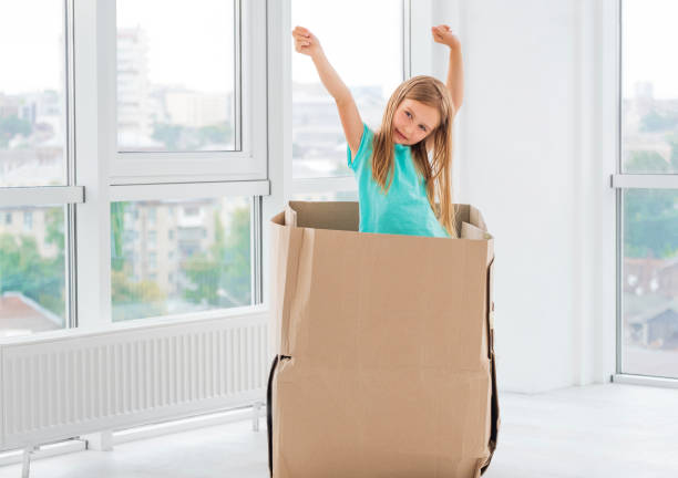 istock Little girl dancing in the box 1448473343
