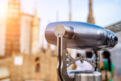 binocular on the top of the famous Duomo Cathedral of Milan