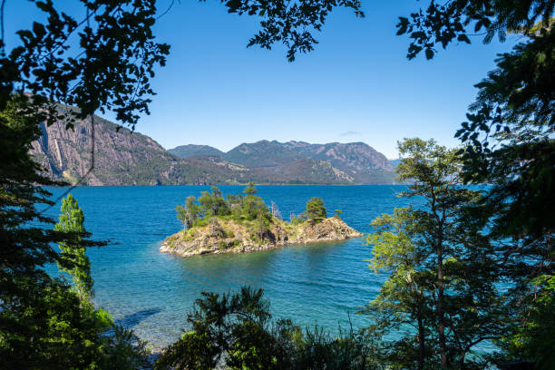 lacar lake is a lake of glacial origin in san martin de los andes. The area around the lake is mostly uninhabited. panoramic view of lacar lake, one of the seven that are located at san martin de los andes, argentina lácar lake photos stock pictures, royalty-free photos & images