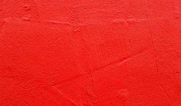 istock Part of wall with rough red paint on surface, as texture or background 1448477704