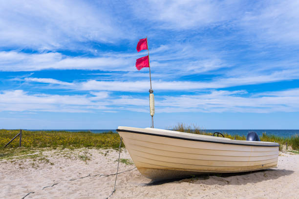 istock Fishing boat on the Baltic Sea coast in Zingst, Germany 1448477900