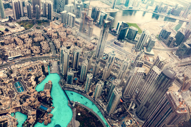 istock Dubai UAE aerial rooftop view from Burj Khalifa in clouds. 1448478374