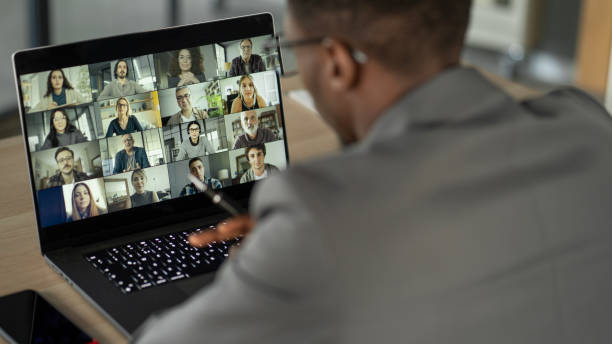 Talking and working on video calling Talking and working on video calling virtual event stock pictures, royalty-free photos & images