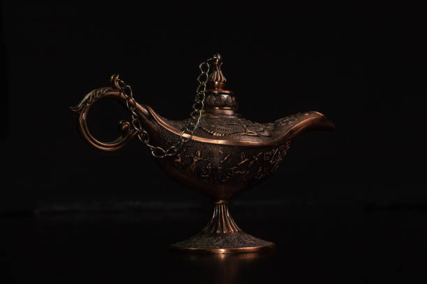 istock Aladdin's magic lamp isolated on black background 1448480687