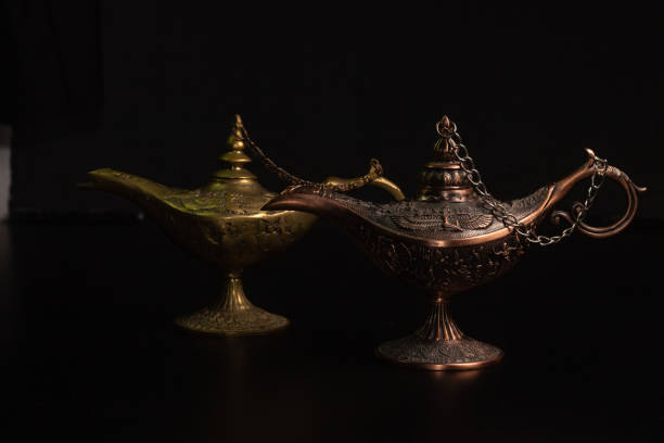 istock Aladdin's magic lamp isolated on black background 1448480692
