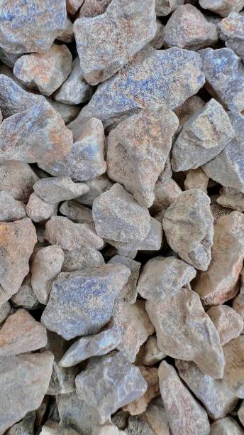 istock Macro Shot of Tiny crushed stones and pebbles 1448482138