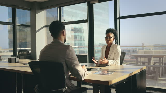 People, black business people and modern office for client negotiation, communication or collaboration interview with corporate talk. Leader, boss woman in conference room for b2b project development