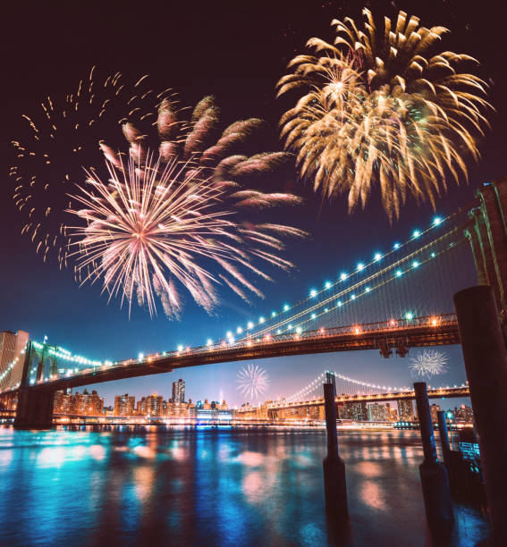 manhattan bridge with fireworks manhattan bridge with fireworks new years eve new york stock pictures, royalty-free photos & images