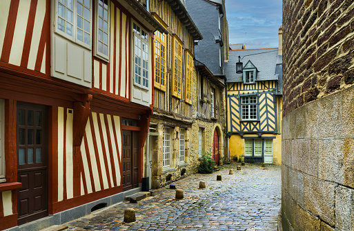 Medieval street with typical half-timbered houses in the French city of Rennes.