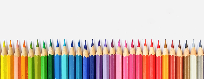 Wooden colored pencils. Multi-colored for wallpaper background and use text placement design