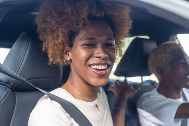istock Couple in a car driving 1448483737