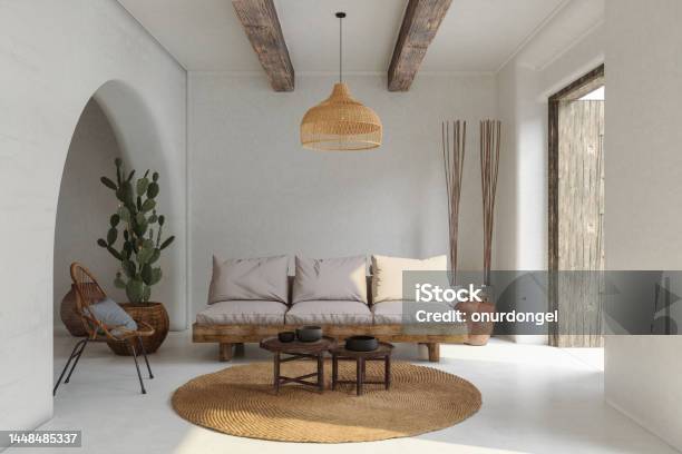 Living Room Interior With Sofa Wicker Armchair Cactus Plant And Coffee Table Stock Photo - Download Image Now