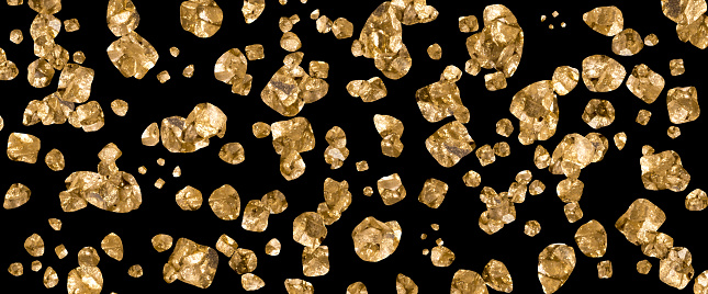 golden nuggets texture black background full frame