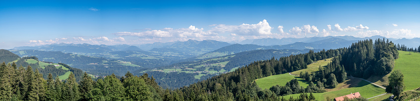 Mountain landscape seen from the Pfänder mountain in the Vorarlberg Alps in Austria during summer.