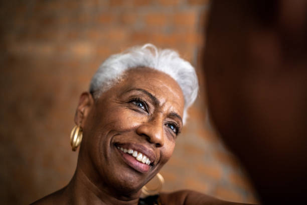 istock Senior woman looking at her husband at home 1448500636