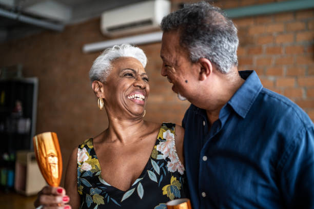 istock Senior couple looking at each other at home 1448500653