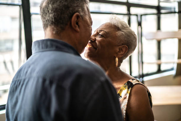 istock Senior couple looking at each other at apartment 1448500664