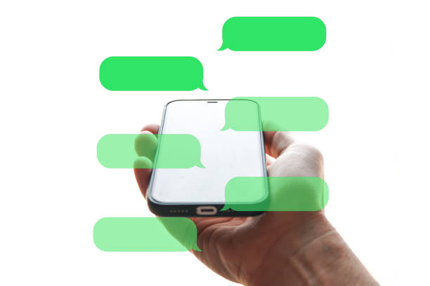 istock hand holding a smartphone with chat symbol, texting on the phone, phone addiction 1448500669