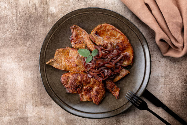 istock A plate of fried beef liver with caramelized onions and sage. 1448501656