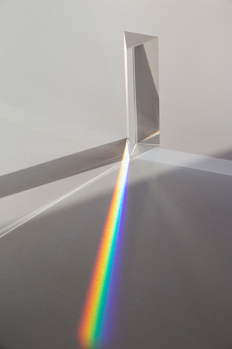 Glass prism decomposing sun light