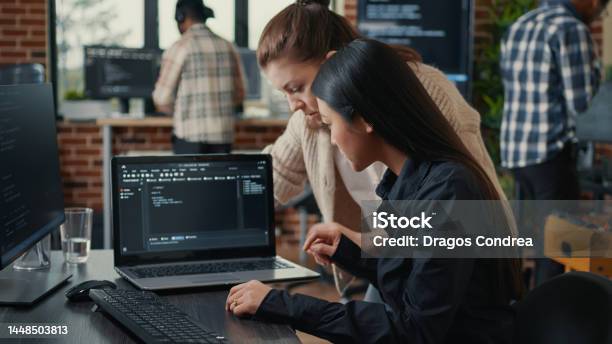 Running Software Developer Team Of Software Developers Talking About Source Code Running On Laptop ...
