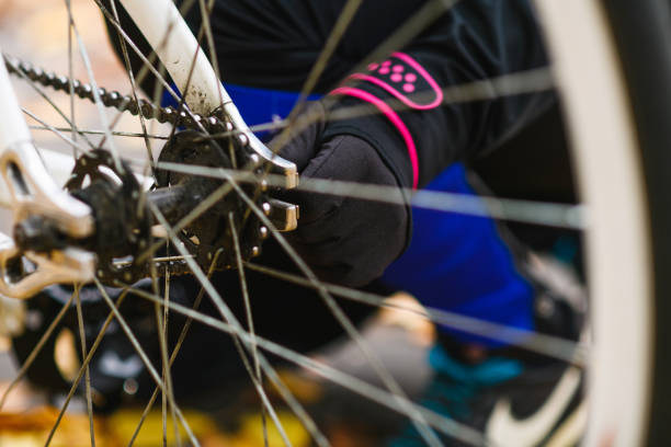 istock Bicycle chain and spokes at wheel close 1448505059
