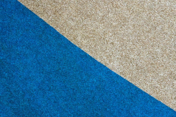 istock compound two colors blue and gray of carpet carpet texture background. Diagonal line joint of carpeting, full frame, top view. 1448505628